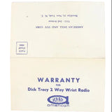 Warranty card for Dick Tracy 2 Way Wrist Radio on a light blue background