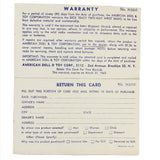 Vintage warranty card with text on a white background