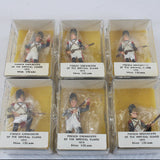 Set of six boxed toy figures of French Grenadiers from the Imperial Guard on a white background.