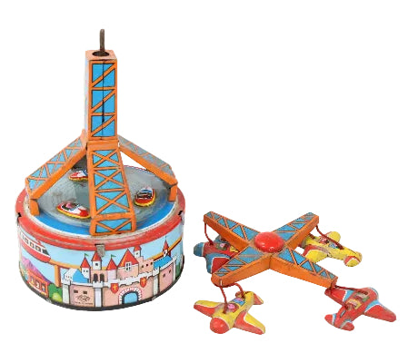 Vintage tin toy set featuring a colorful carousel tower and three matching toy airplanes on a plain white background.