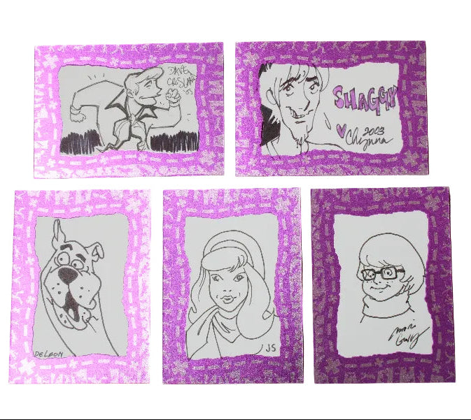 Five custom cartoon art cards featuring Scooby-Doo characters like Shaggy and Scooby, each with a purple patterned border and black line art on a black background.
