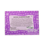 A collectible Swynna Clueston-Major 'Scooby-Doo!' trading card back, featuring a purple and white design with character details and the Inkworks logo, photographed on a dark textured surface.