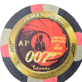 A circular 007 James Bond themed poker chip on a dark textured background. The chip features a black outer ring with pink and gray segments, a gold inner ring, and a red and black center graphic with the text 'JAMES BOND', '007', 'AP', 'LIMITED EDITION OF 3000', and 'inkworks'.